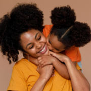 Happy mother with daughter enjoying the benefits of fibroid embolisation