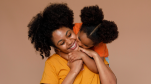 Happy mother with daughter enjoying the benefits of fibroid embolisation