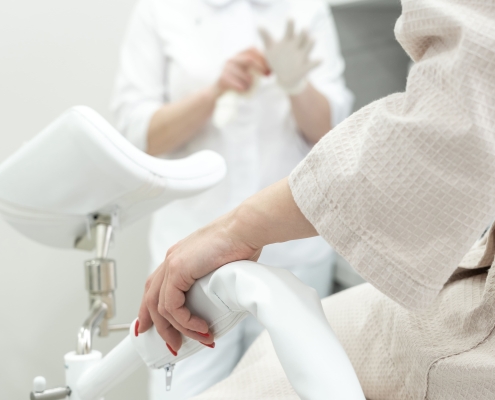 Doctor talking to patient about uterine fibroid embolisation success rates in South Africa