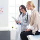 Specialist and patient discussing the best UFE clinic in South Africa while sitting in a consultation room