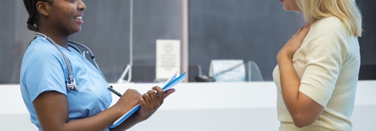A patient talking to her doctor about fibroids and treatment options.