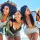A smiling group of attractive females having fun and demonstrating the link between UFE and quality of life